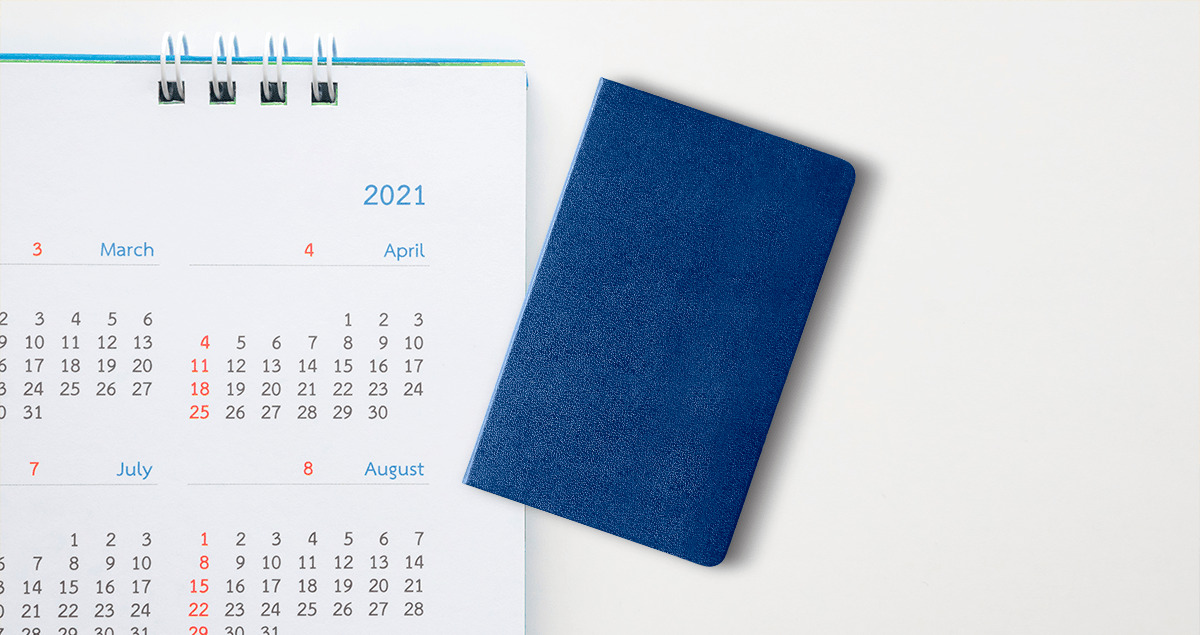 Imagem de calendário com carteira de trabalho ao lado